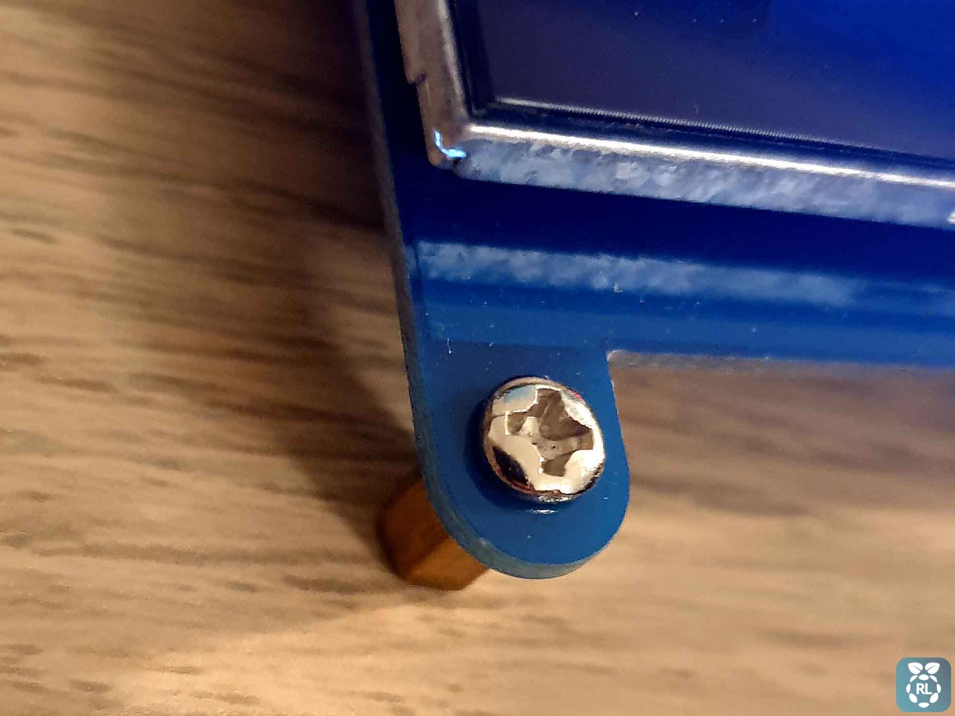 Screw and nut on 7-inch screen